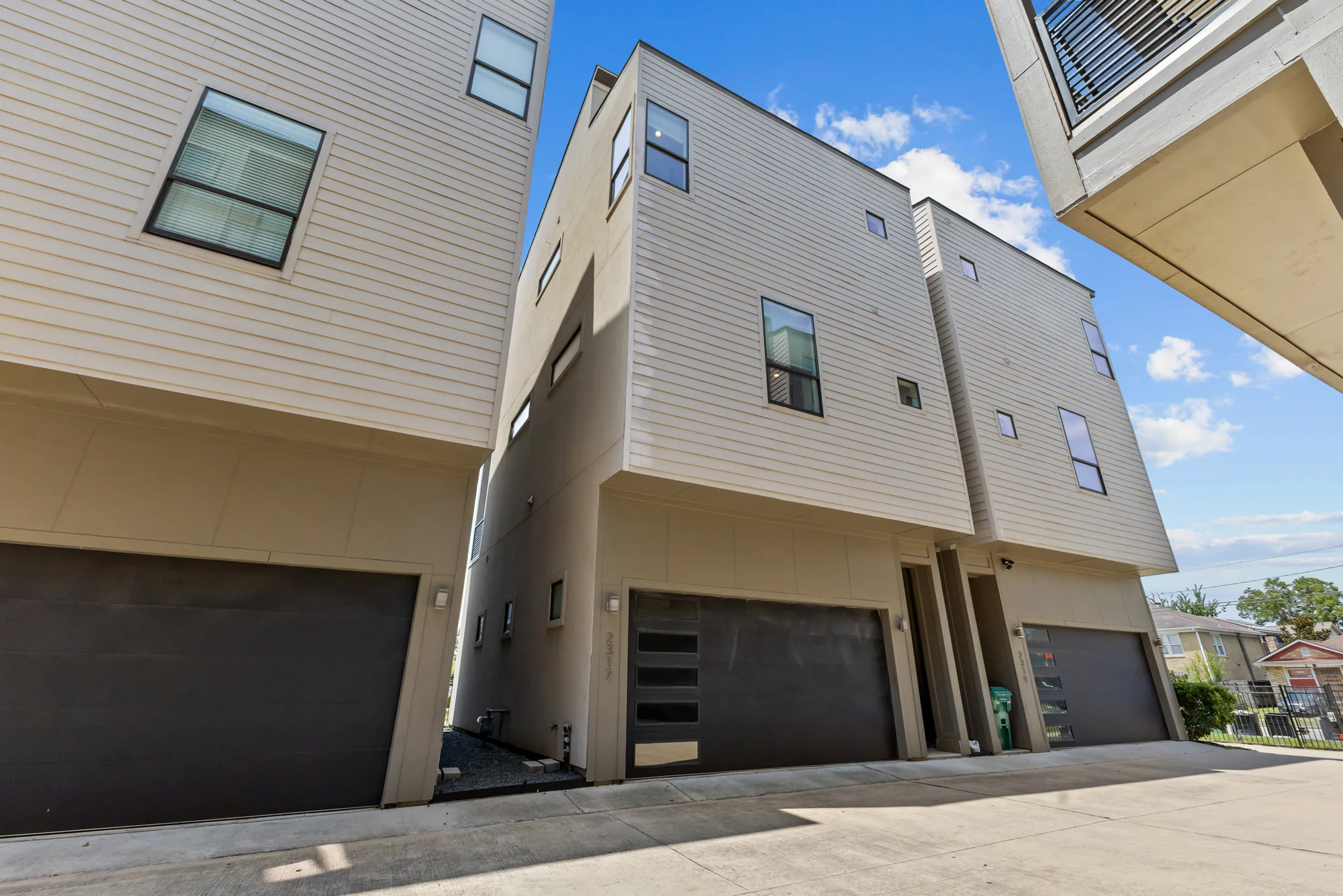 Rear garage elevations of modern townhomes