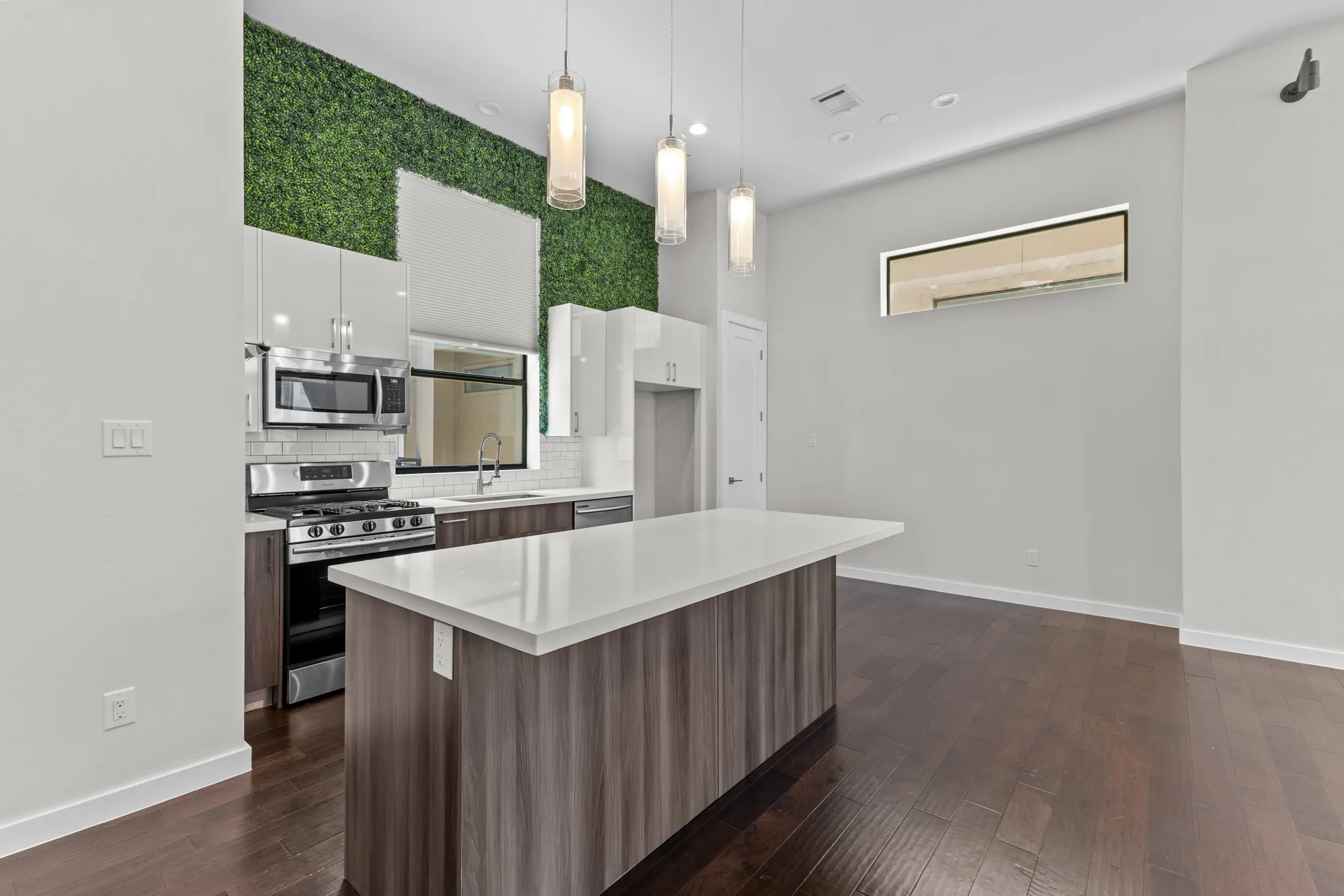 Modern kitchen with large waterfall-style island