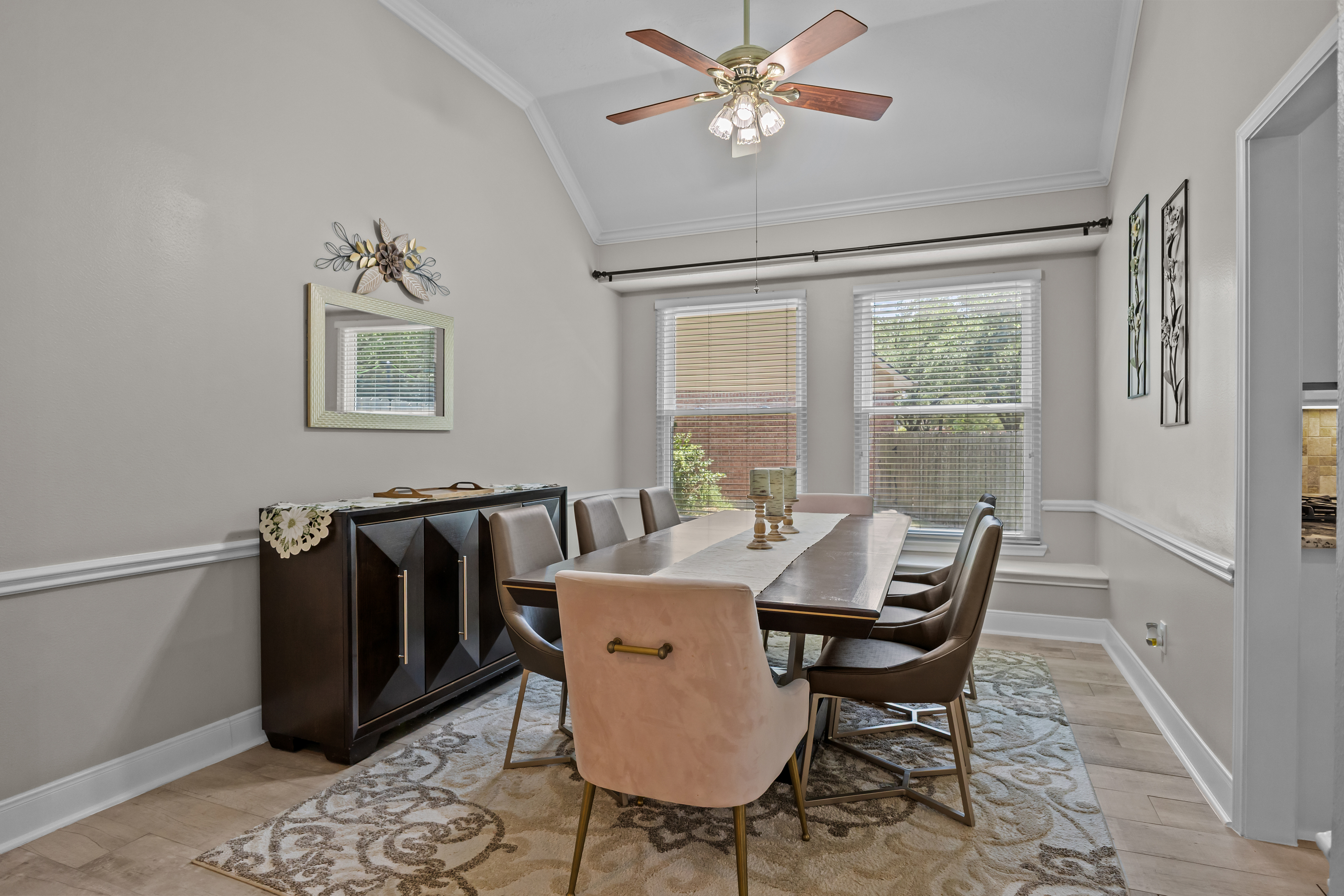 Formal dining room arranged for eight guests