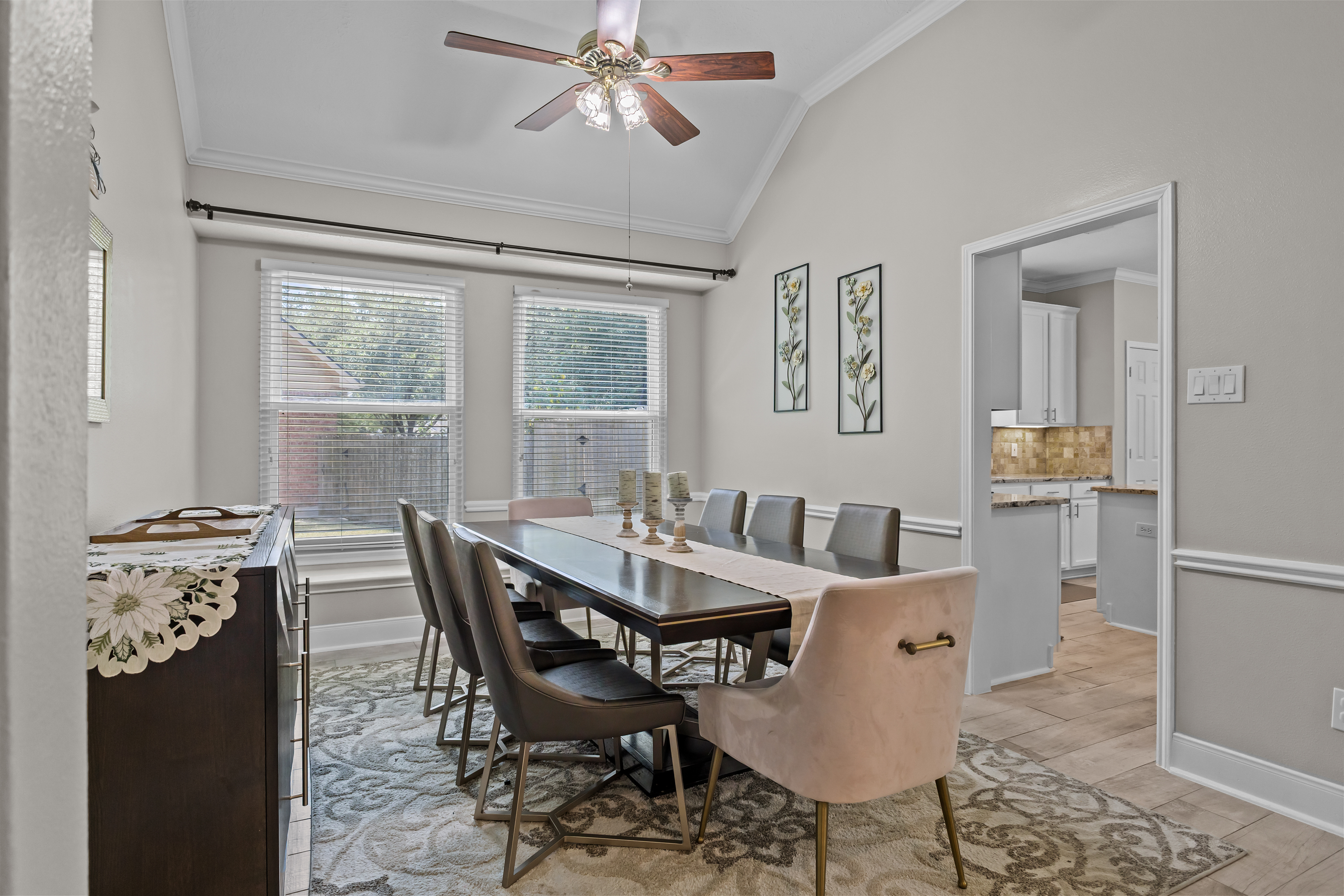 Bright dining room with views toward the kitchen