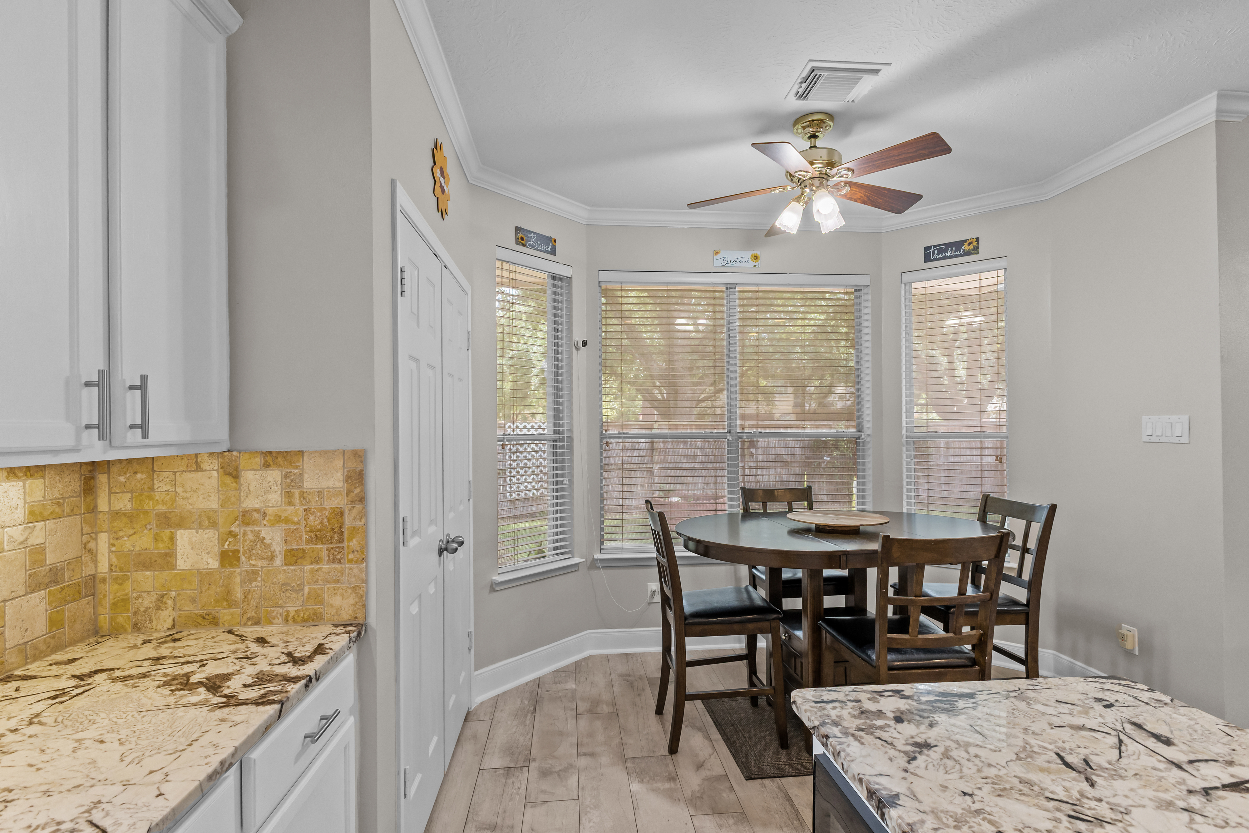 Breakfast nook surrounded by windows