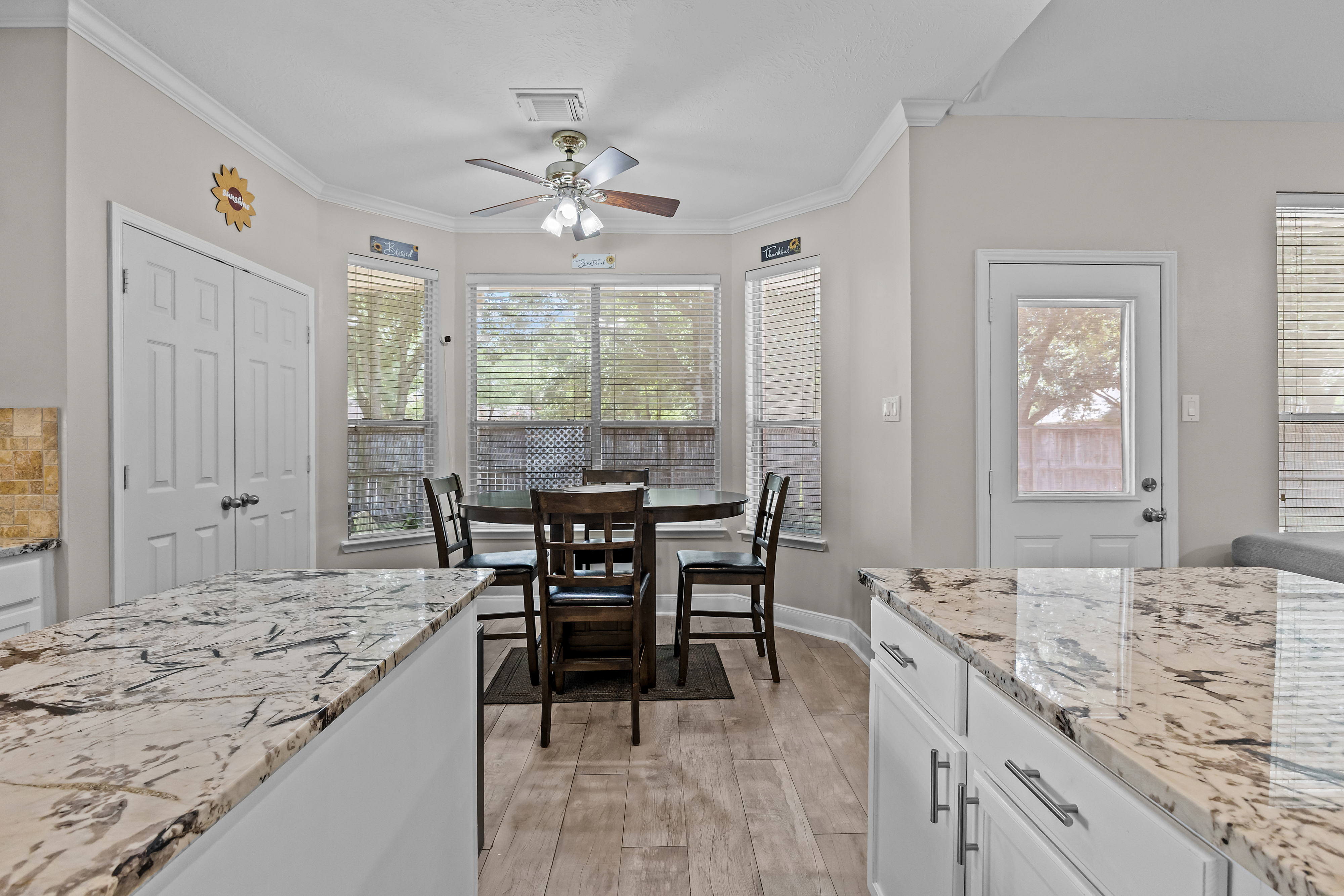 Breakfast area framed by two kitchen counters