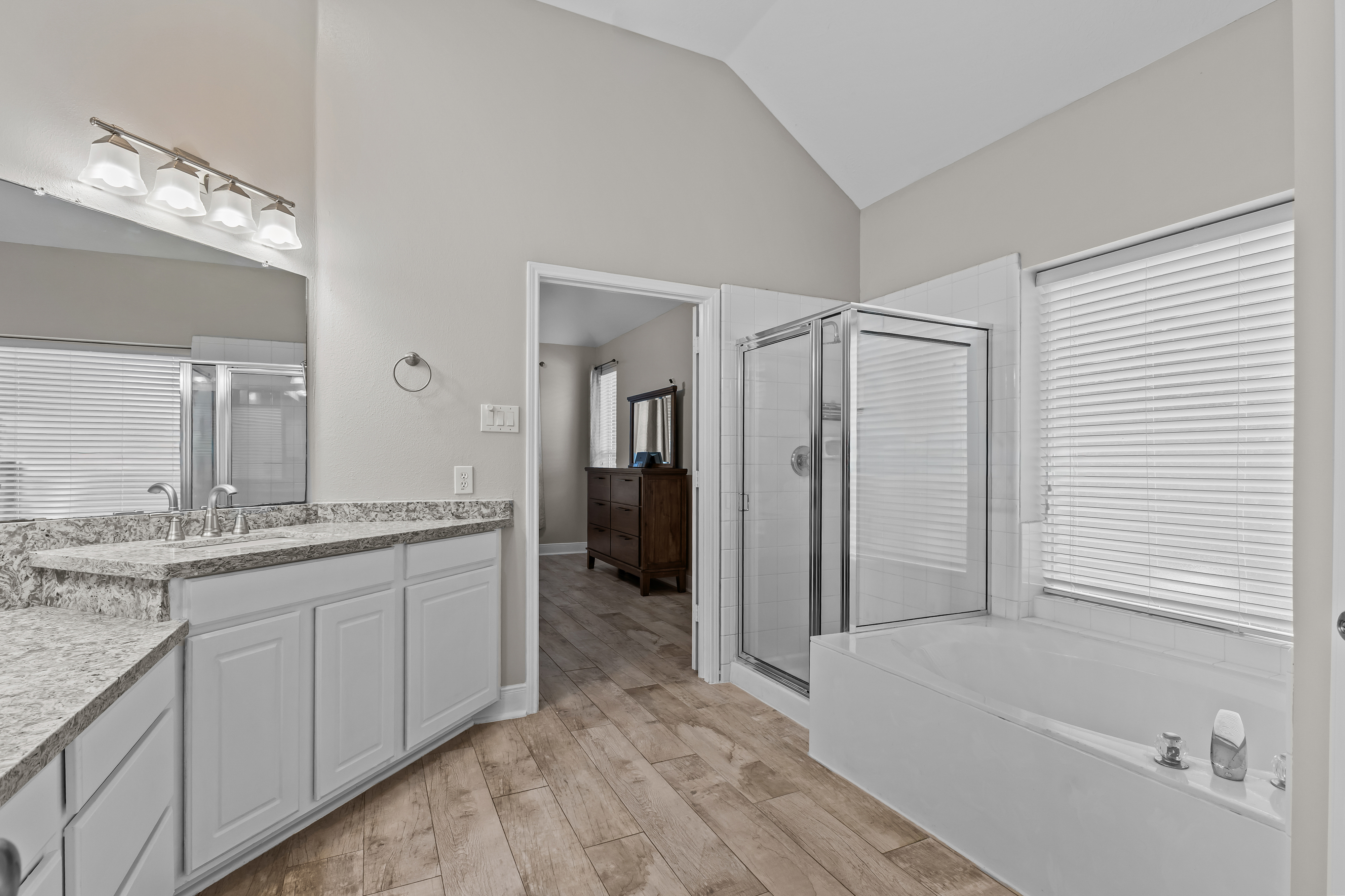 Primary bathroom with soaking tub and separate shower