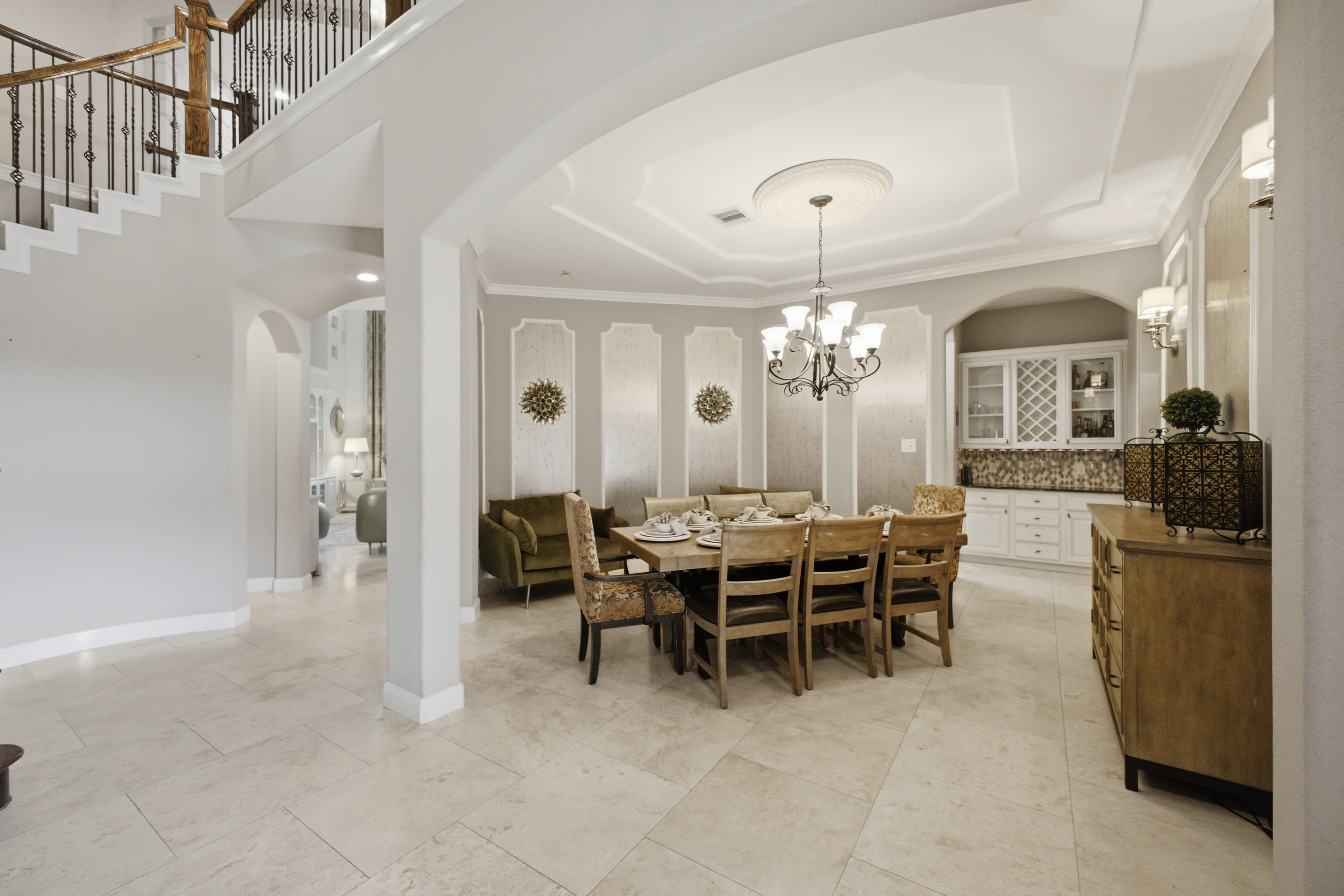 Open modern white dining area photographed by Dark Room Photography