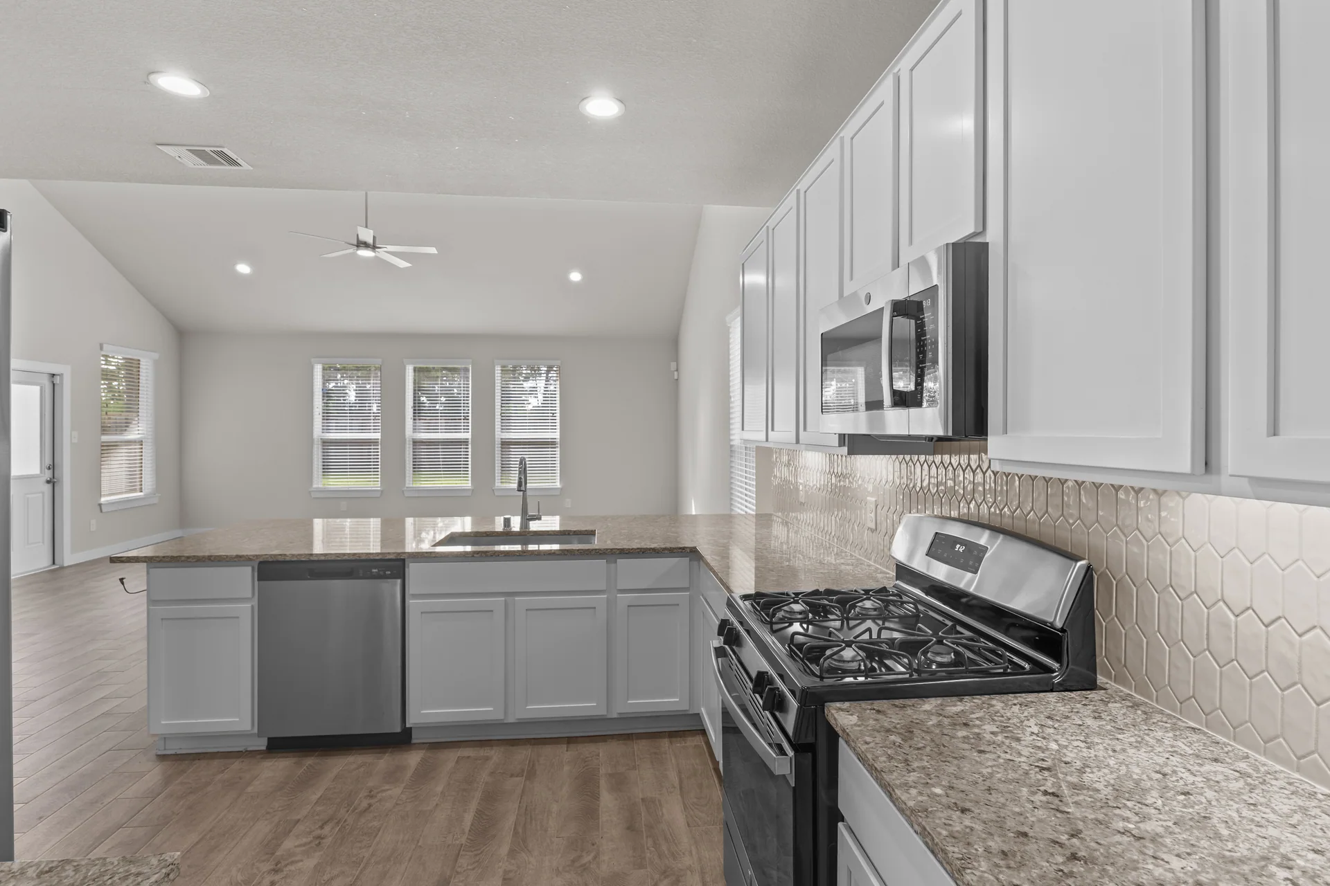 Bright suburban kitchen photographed from the dining area